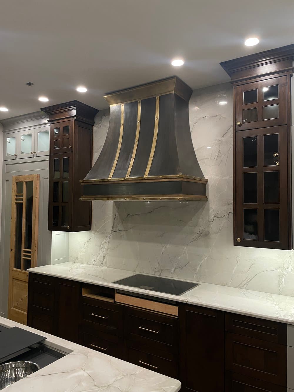 Signature Collection — Monarch custom metal range hood