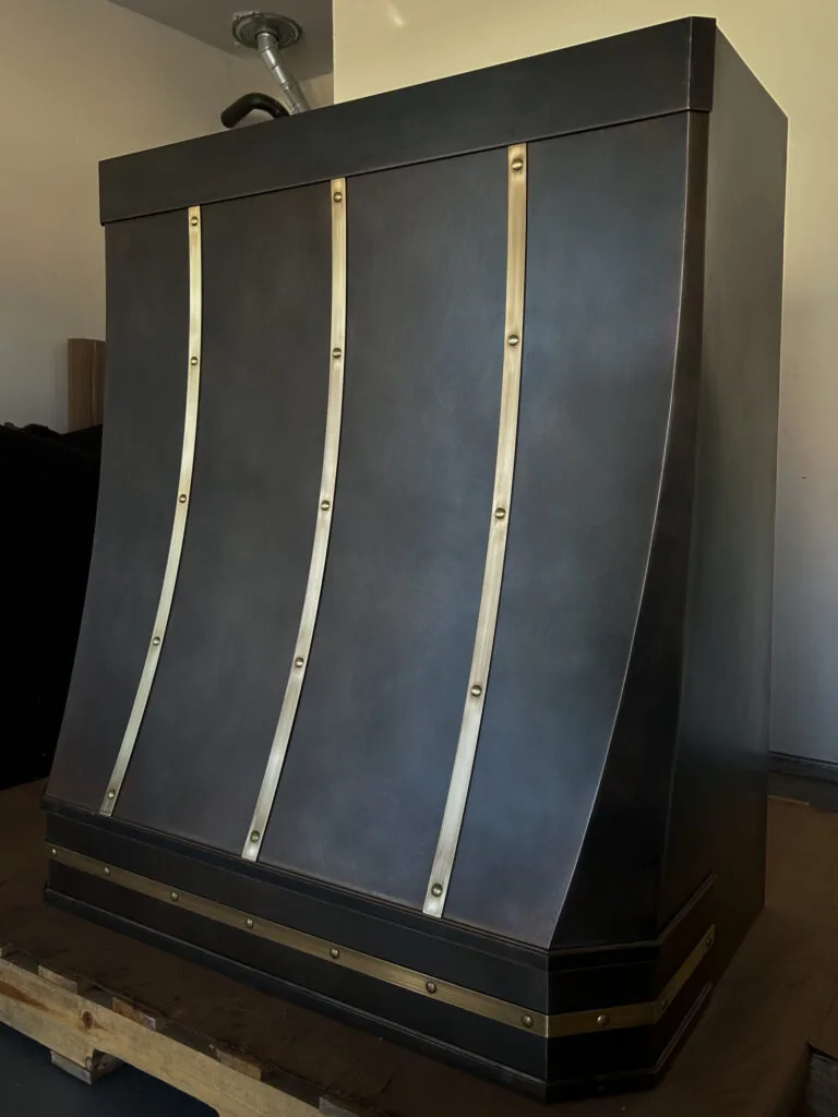 Monarch antiqued cloudy copper custom range hood, workshop view 2