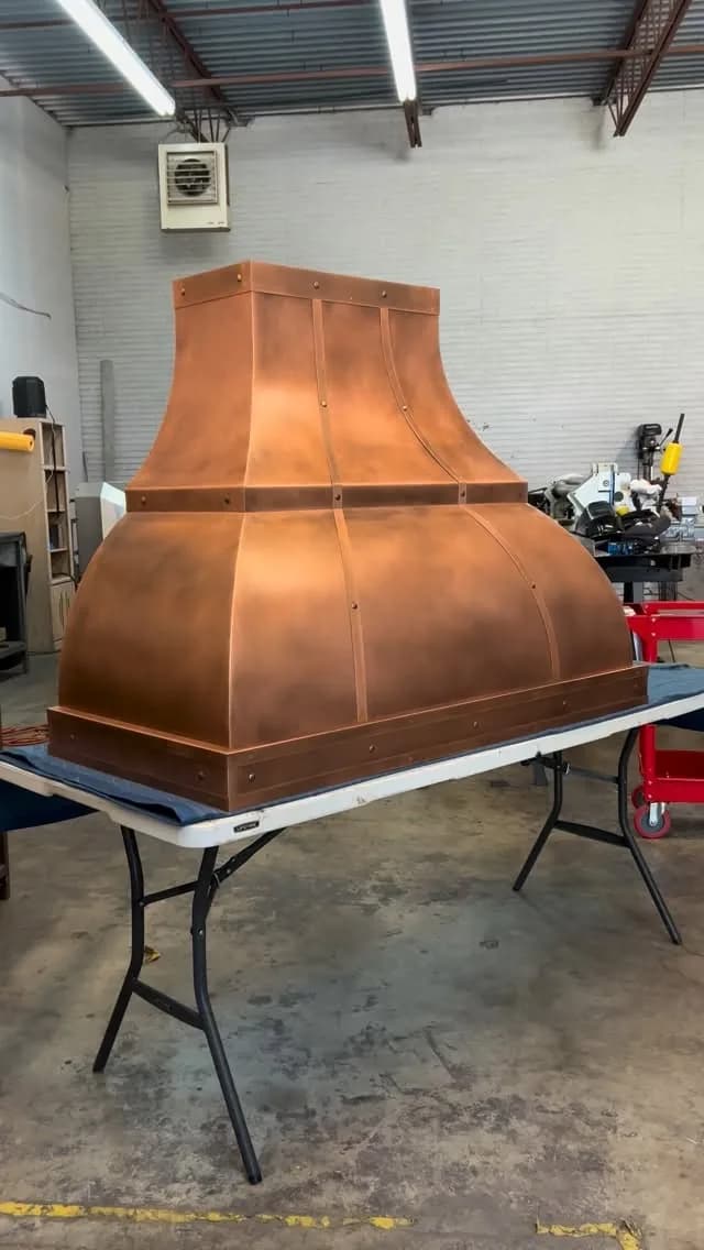 Monarch cloudy copper custom range hood, workshop view 1