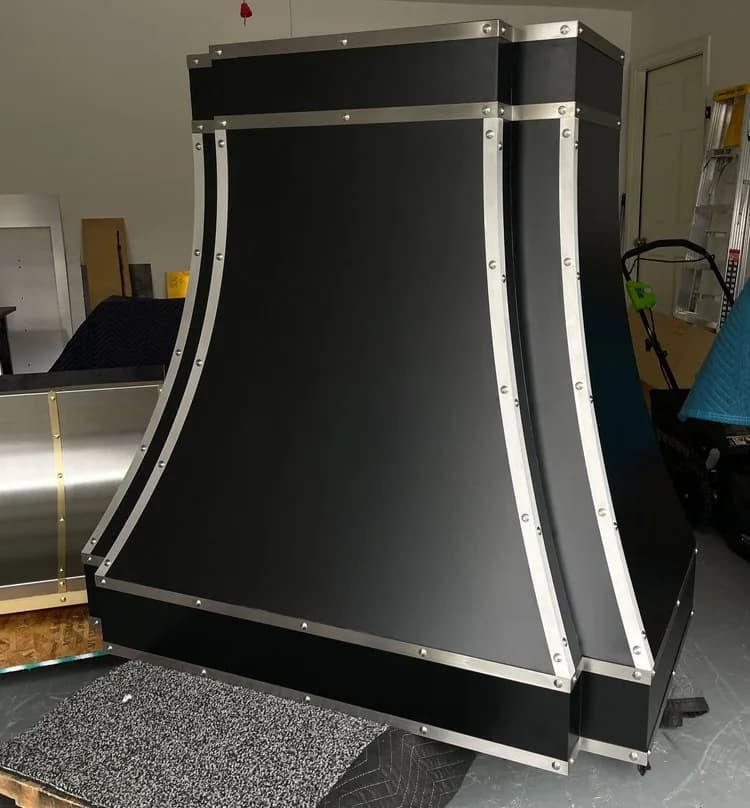 Monarch powder coated mild steel custom range hood, workshop view 1