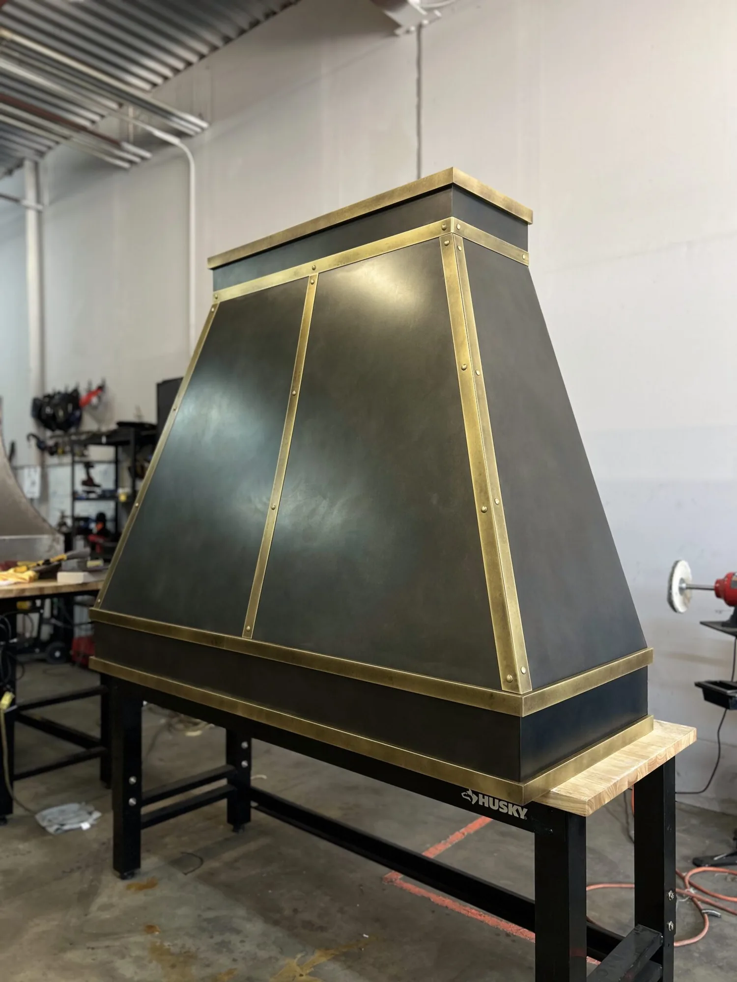 Monarch antiqued cloudy stainless steel custom range hood, workshop view 2