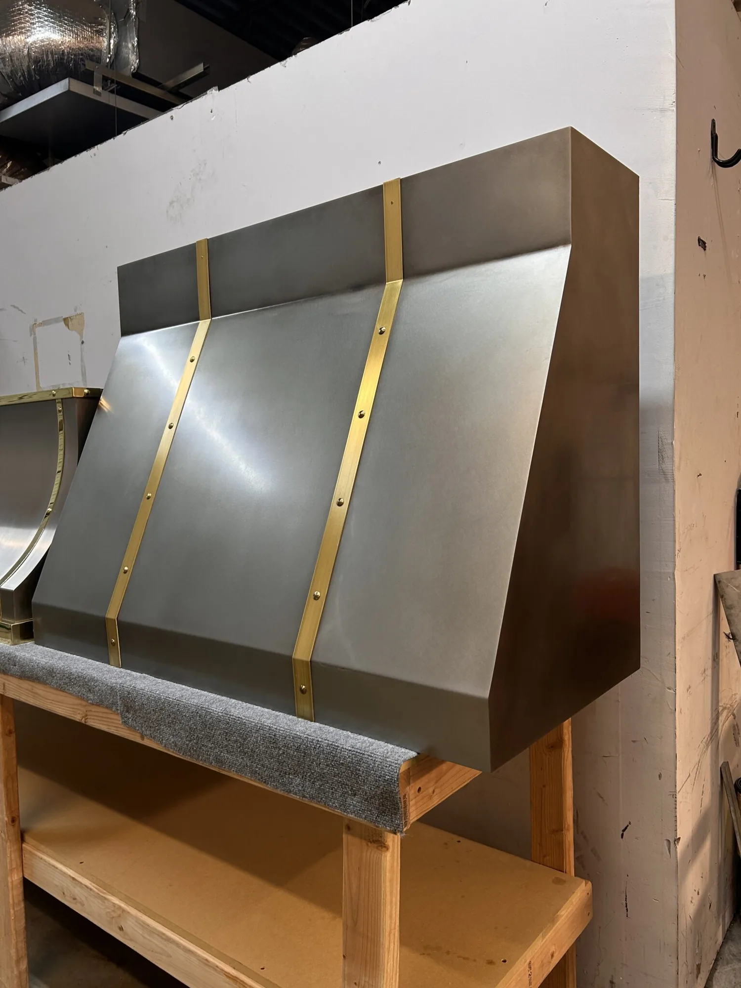 Monarch antiqued cloudy stainless steel custom range hood, workshop view 3