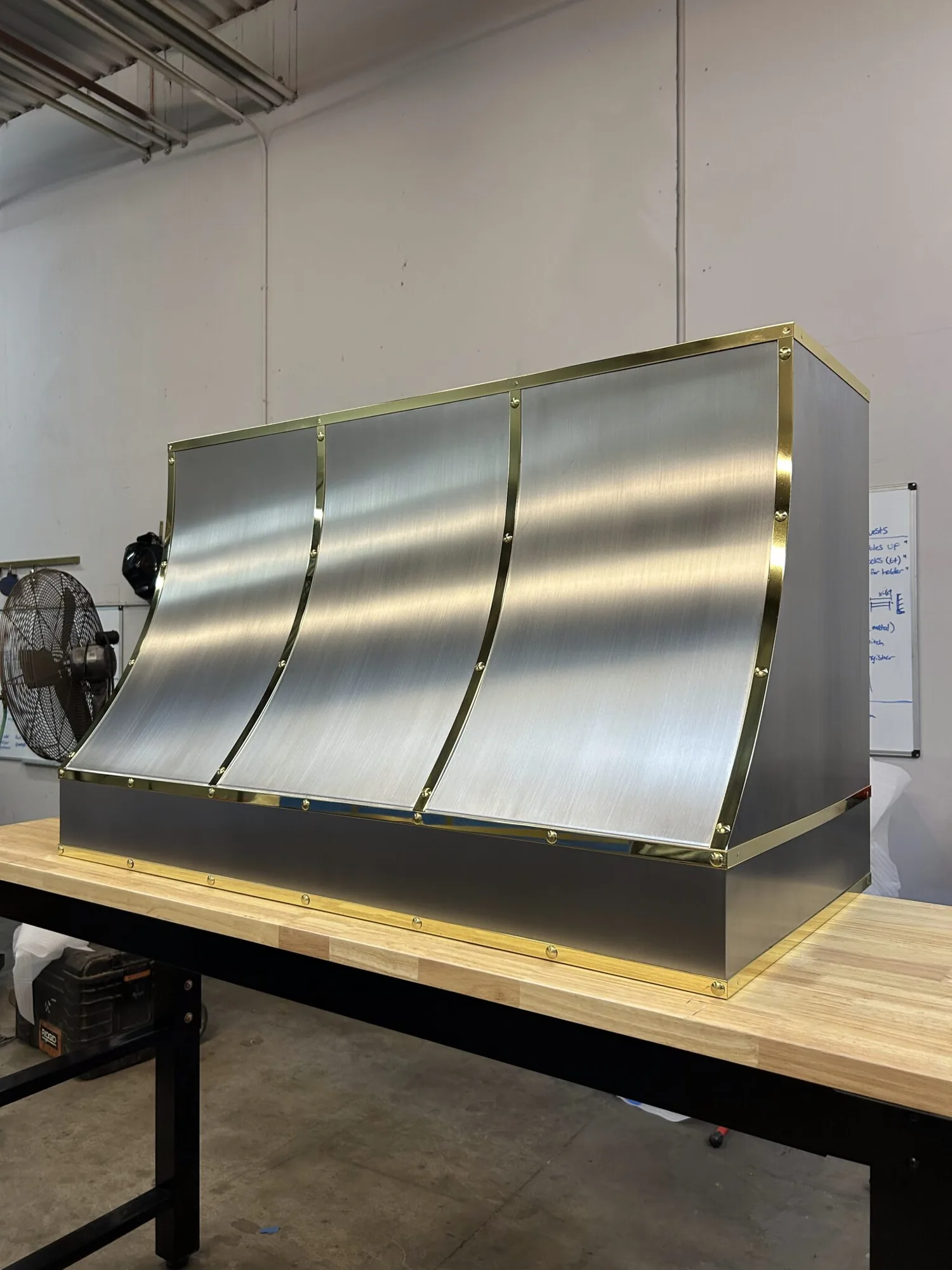 Monarch brushed stainless steel custom range hood, workshop view 2