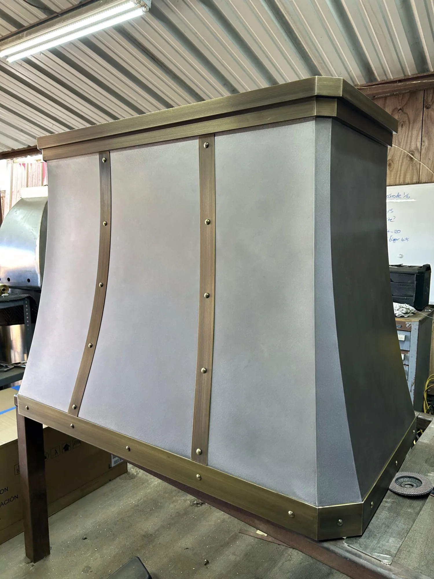 Monarch cloudy stainless steel custom range hood, workshop view 2