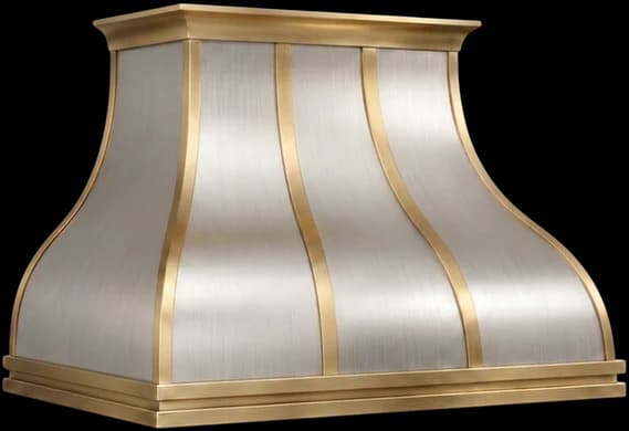 The Northport Luxe range hood in brushed stainless steel with brushed brass trim and tube banding.