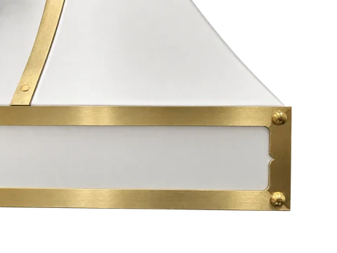 Close detail of the hood's one-inch brass strap, rivets and scalloped corner