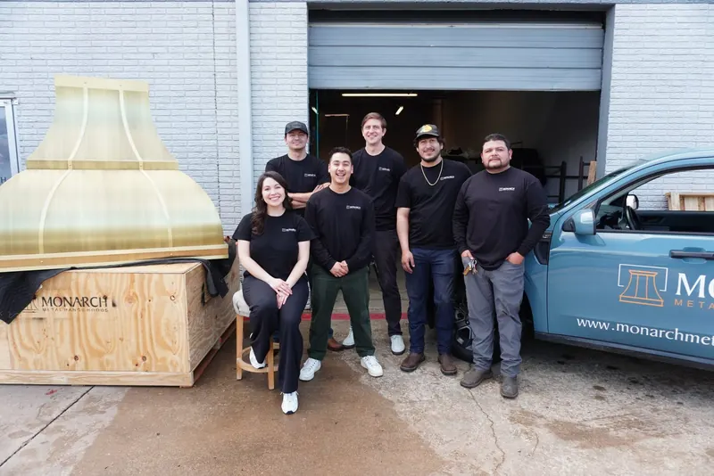 The Monarch Metal Range Hoods team outside the Garland, Texas studio